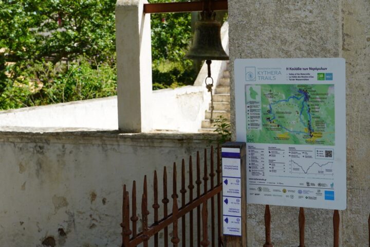 A trailhead sign with a map from the Kythera Trails network in Mylopotamos