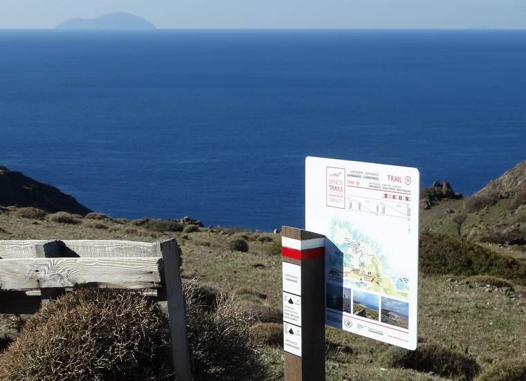 A trailhead sign with a map on the trails of Sifnos