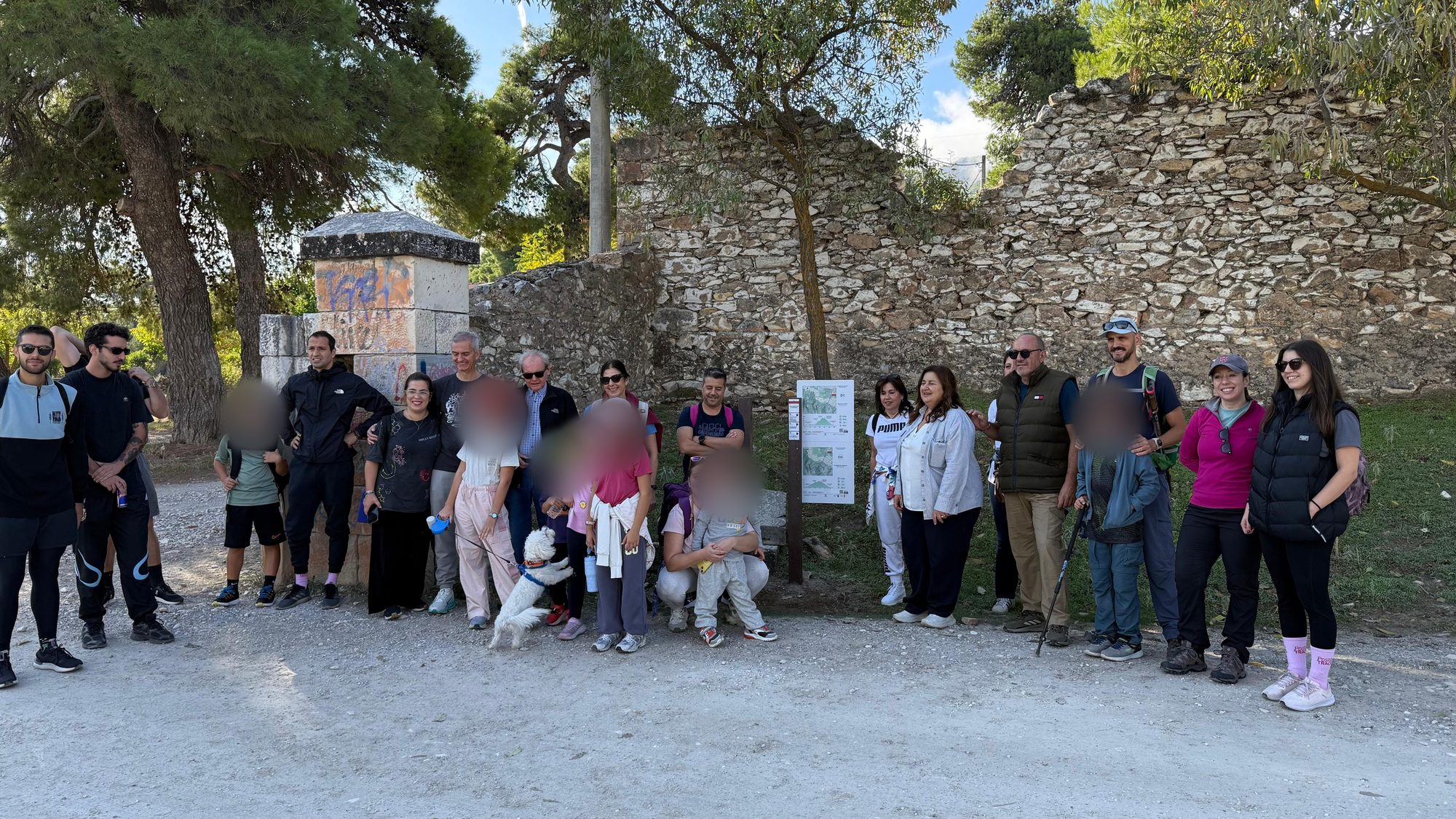 Group photo of hikers at the start of trail D1 Penteli Panorama, in the Penteli Regeneration Trails network, with Andriaki Shipping employees